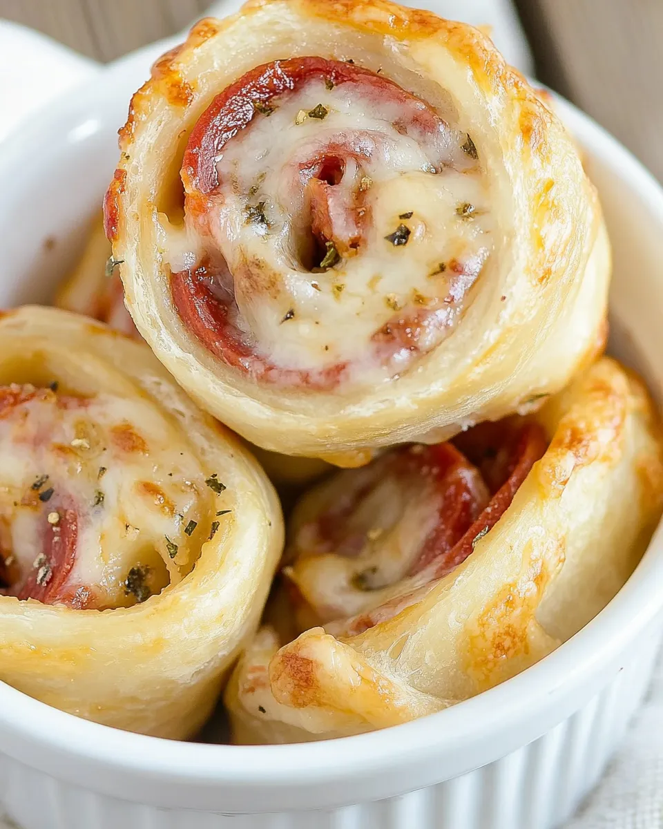 Delicious Easy Cheesy Pepperoni Pinwheels recipe photo