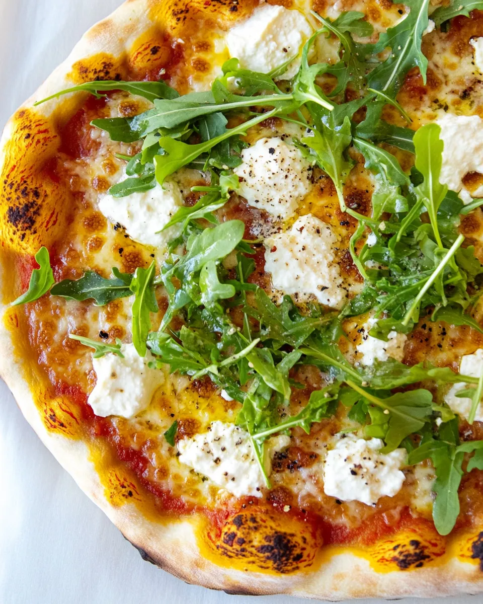 Delicious Three-Cheese Arugula Pizza recipe photo